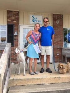 Sarah, Jeff, Earl and Tooter in front of Sea Paws.